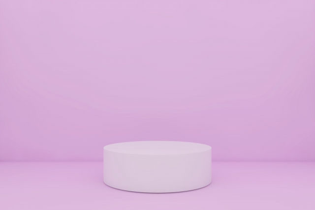 ピンクの背景と撮影用の台